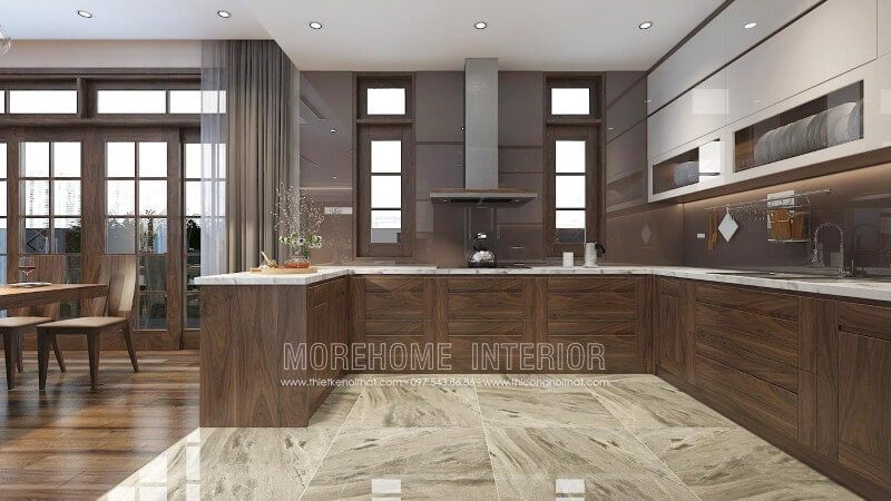 Có đường vân bắt mắt với màu sắc sang trọng và mẫu tủ bếp chữ u gỗ óc chó hấp dẫn ánh nhìn của bất cứ vị khách nào đến thăm nhà.